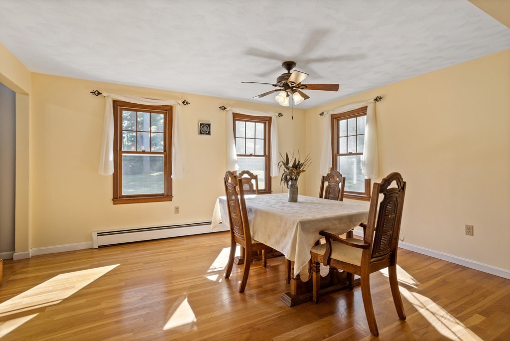 10 Pheasant Ridge Road Townsend, MA 01469 - Photo 18 of 40 a view of a a dining room with furniture window and wooden floor