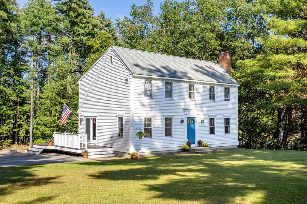 10 Pheasant Ridge Road Townsend, MA 01469 - Photo 2 of 40 a view of a house with swimming pool and a small yard