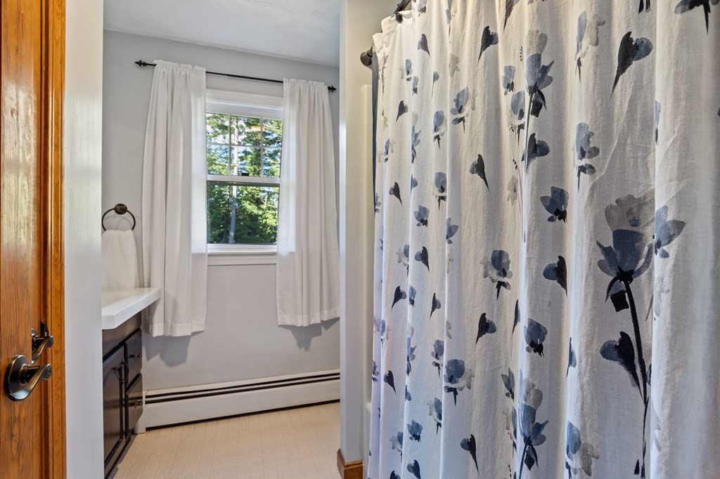 10 Pheasant Ridge Road Townsend, MA 01469 - Photo 33 of 40 a bathroom with a shower and a sink