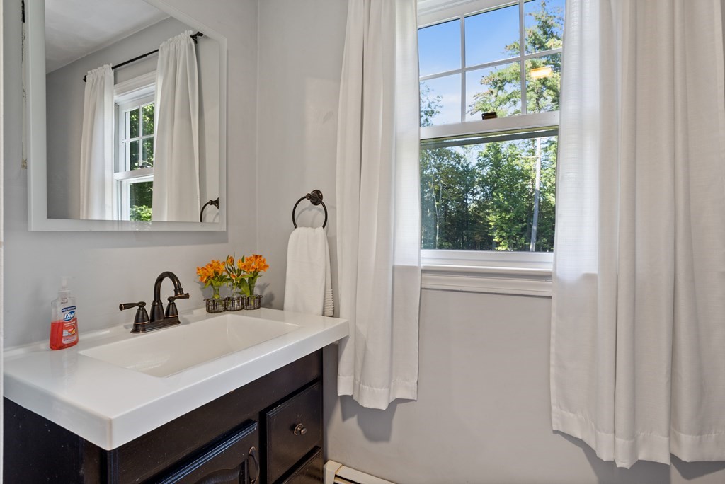 10 Pheasant Ridge Road Townsend, MA 01469 - Photo 34 of 40 a bathroom with a sink and a toilet