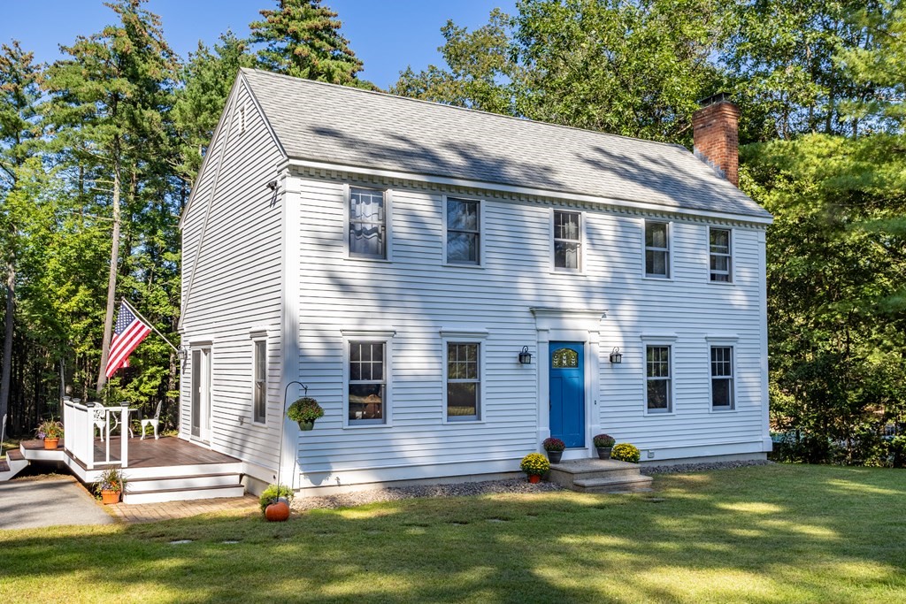 10 Pheasant Ridge Road Townsend, MA 01469 - Photo 5 of 40 a view of house with garden and swimming pool
