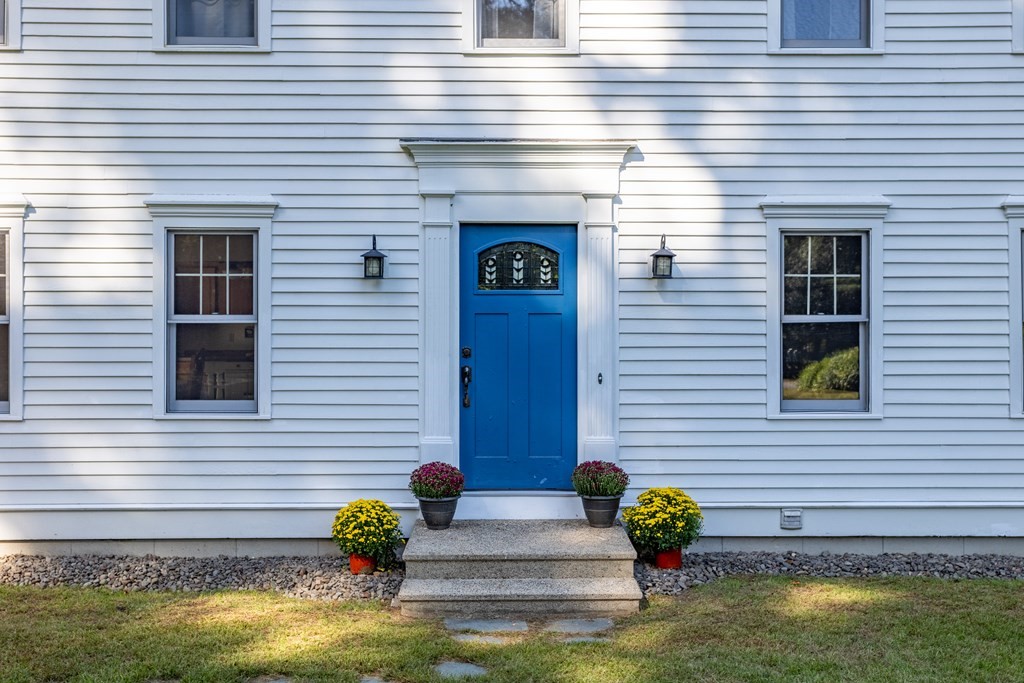 10 Pheasant Ridge Road Townsend, MA 01469 - Photo 6 of 40 a view of a house with a yard and a garage