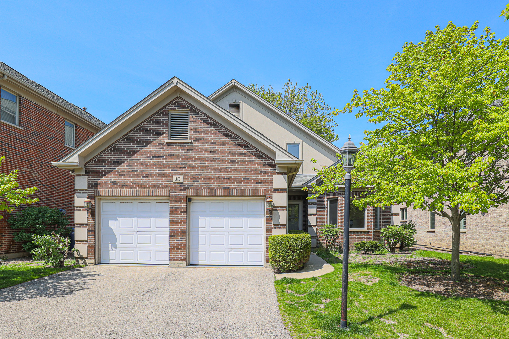 16 Ridge Road Highland Park, IL 60035 - Photo 1 of 41 a front view of a house with garden