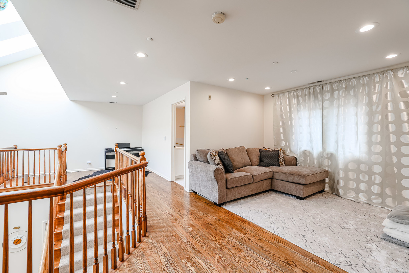 16 Ridge Road Highland Park, IL 60035 - Photo 25 of 41 a living room with furniture and a wooden floor