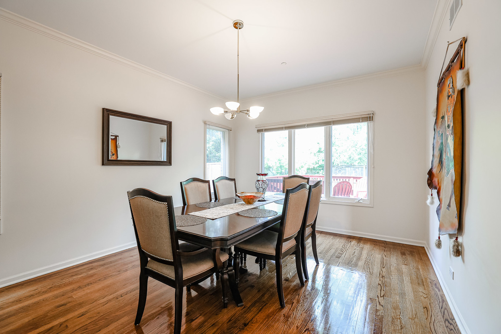 16 Ridge Road Highland Park, IL 60035 - Photo 7 of 41 a view of a dining room with furniture window and wooden floor