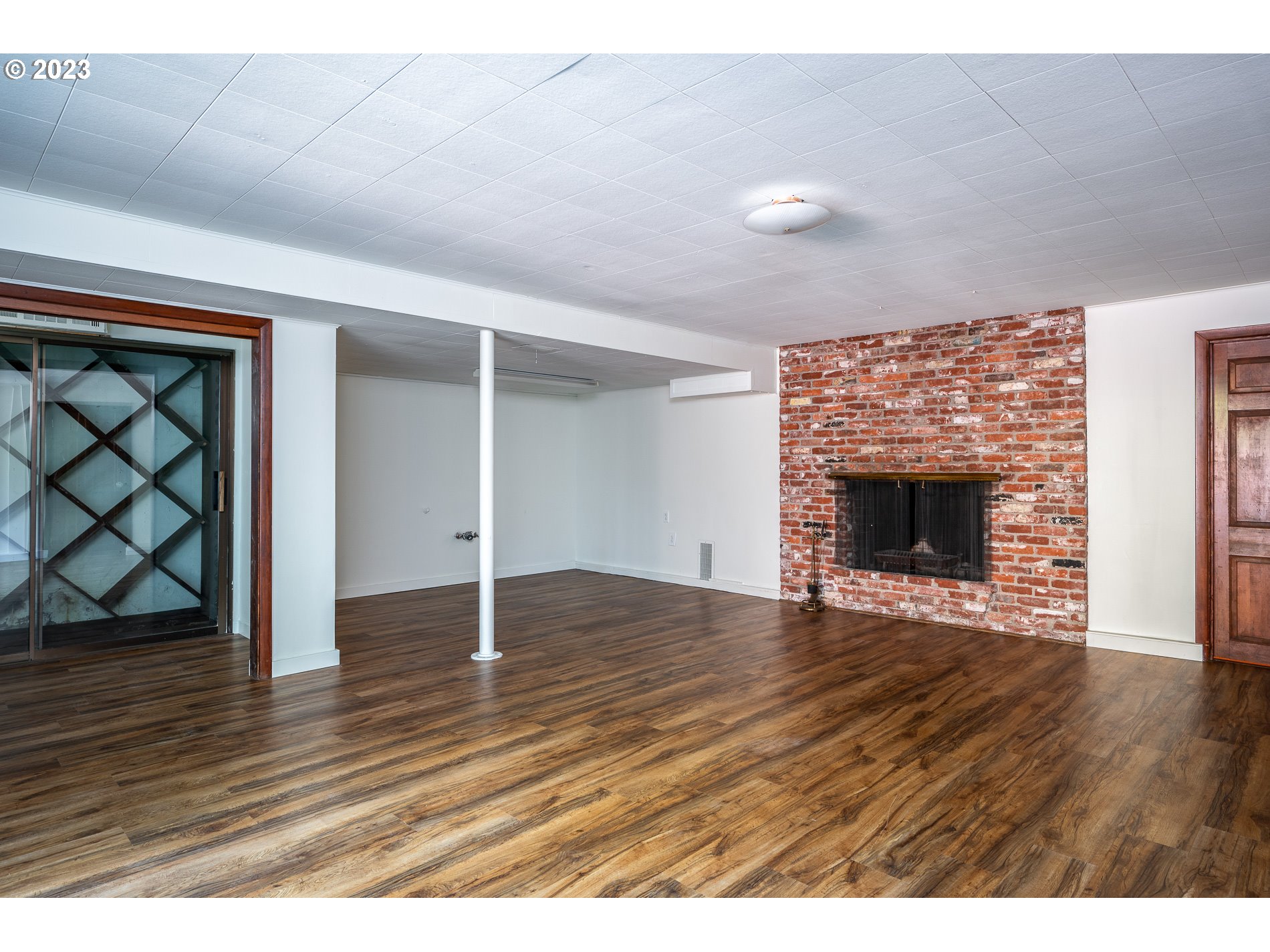 6677 Southwest Bancroft Way Portland, OR 97225 - Photo 25 of 37 Fireplace Wood