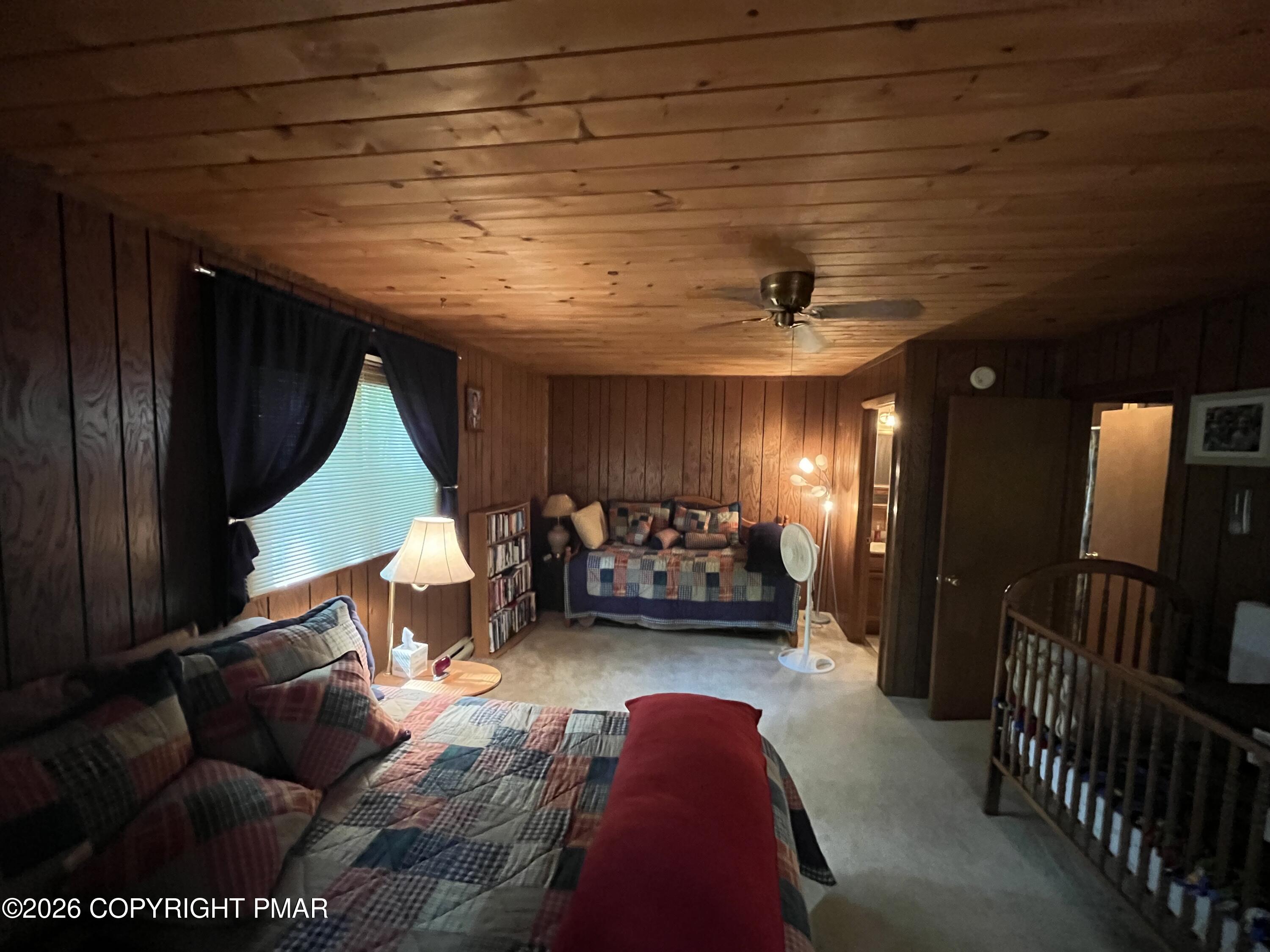 5970 Decker Road Bushkill, PA 18324 - Photo 23 of 26 a living room with furniture and a painting on the wall