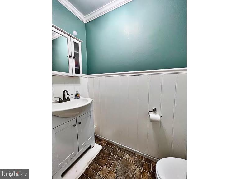 402 Pheasant Circle Bear, DE 19701 - Photo 15 of 17 a bathroom with a sink and a mirror