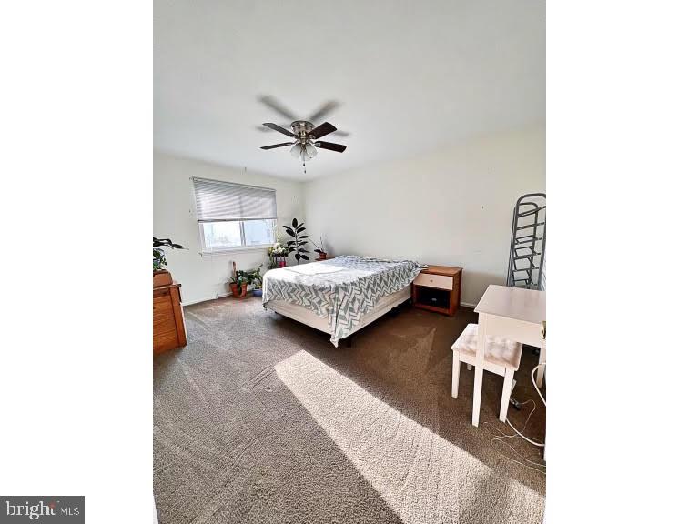 402 Pheasant Circle Bear, DE 19701 - Photo 17 of 17 a living room with furniture and a chandelier