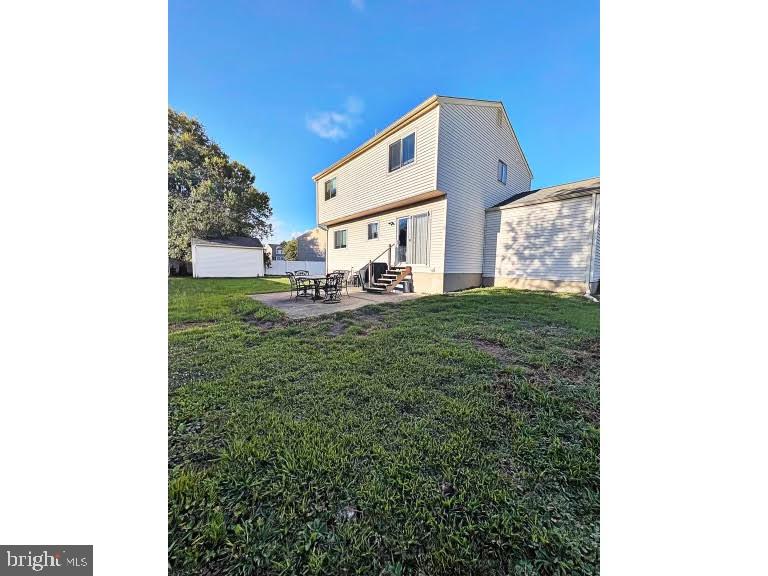 402 Pheasant Circle Bear, DE 19701 - Photo 2 of 17 a view of a house with a yard