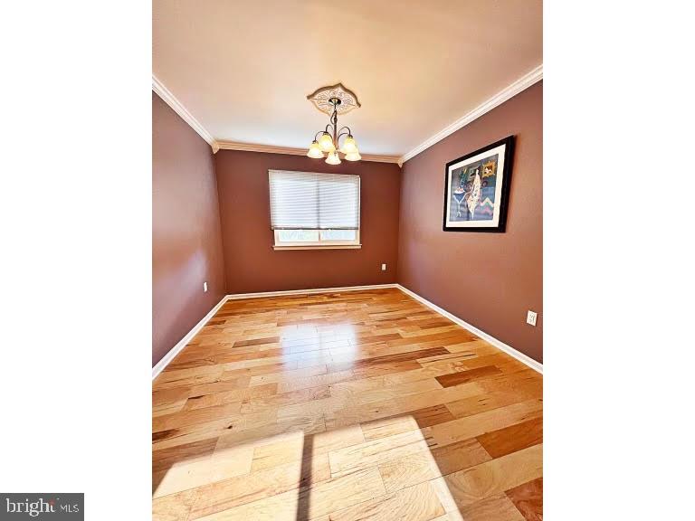 402 Pheasant Circle Bear, DE 19701 - Photo 6 of 17 a bedroom with a bed and a window