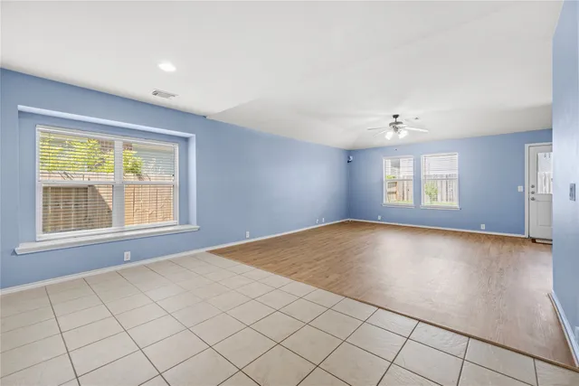 an empty room with windows