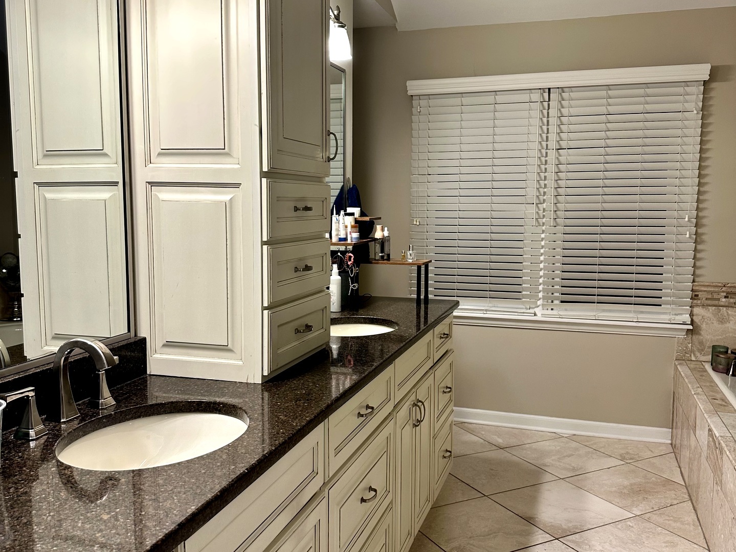 1N539 Turnberry Lane Winfield, IL 60190 - Photo 18 of 41 a bathroom with a granite countertop sink and a mirror