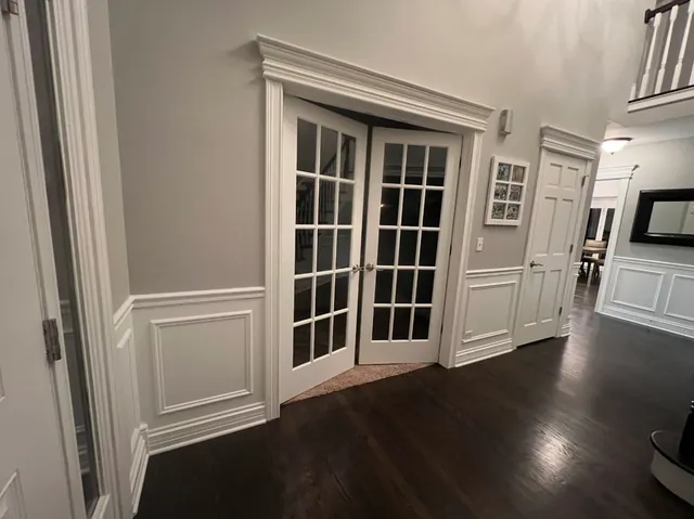 a living room with furniture flat screen tv and a fireplace