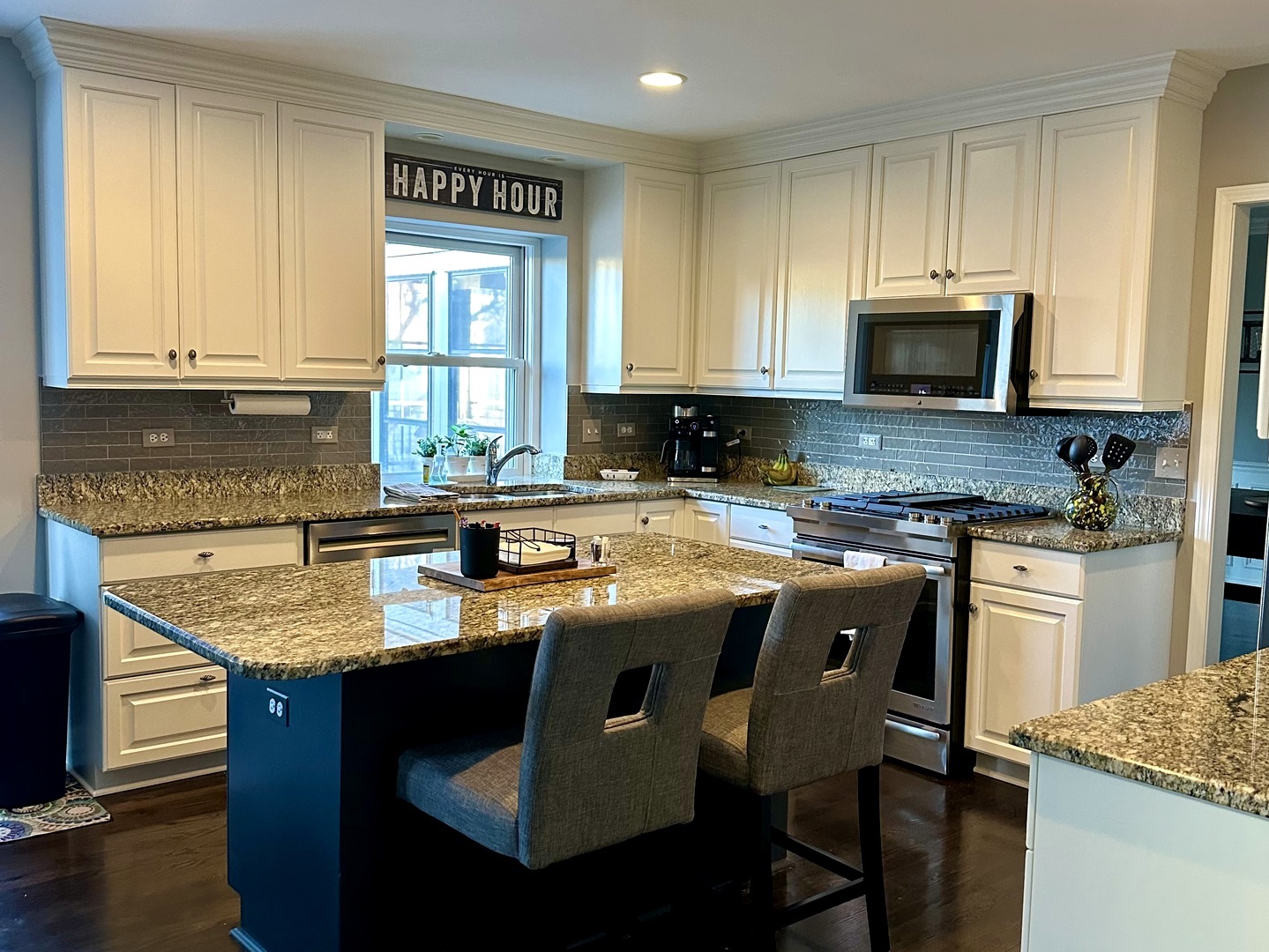 1N539 Turnberry Lane Winfield, IL 60190 - Photo 8 of 41 a kitchen with granite countertop a sink stove and cabinets