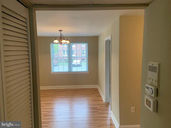 a room with window and wooden floor