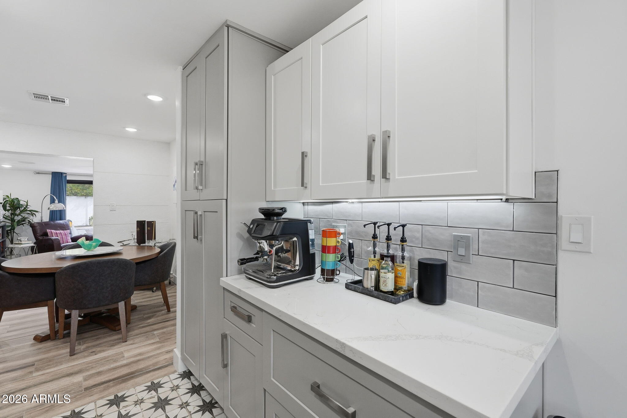 5149 North 34th Street Phoenix, AZ 85018 - Photo 23 of 70 a kitchen with a sink and cabinets