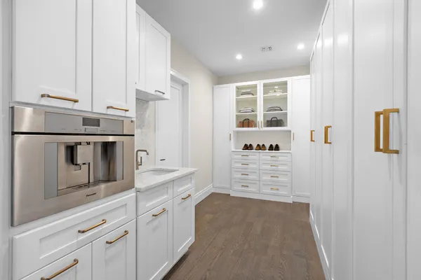 a spacious bathroom with a bathtub and shower