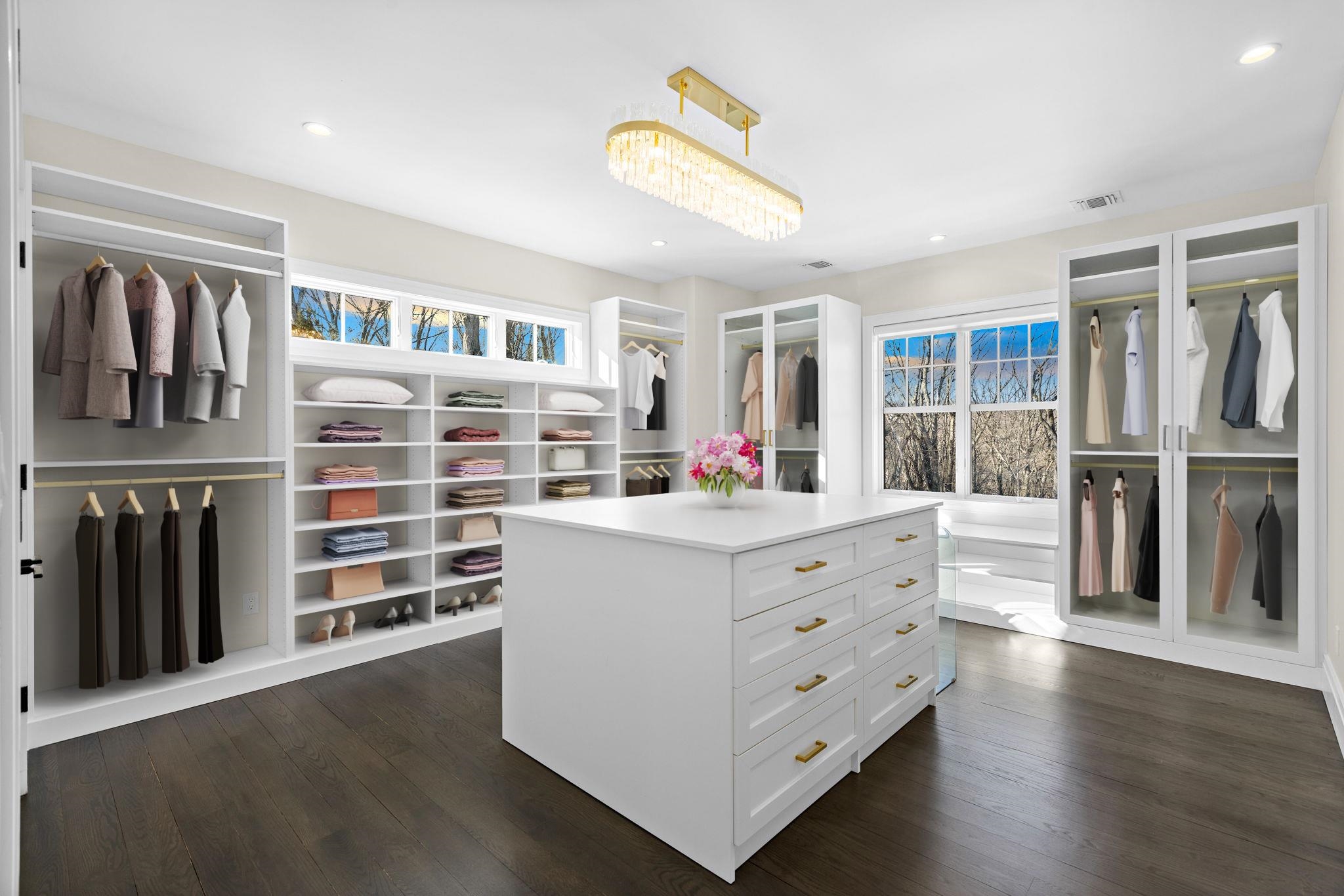 396 Knollwood Road Ridgewood, NJ 07450 - Photo 31 of 50 a kitchen with stainless steel appliances cabinets and wooden floor