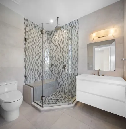 a view of room with furniture and wooden floor