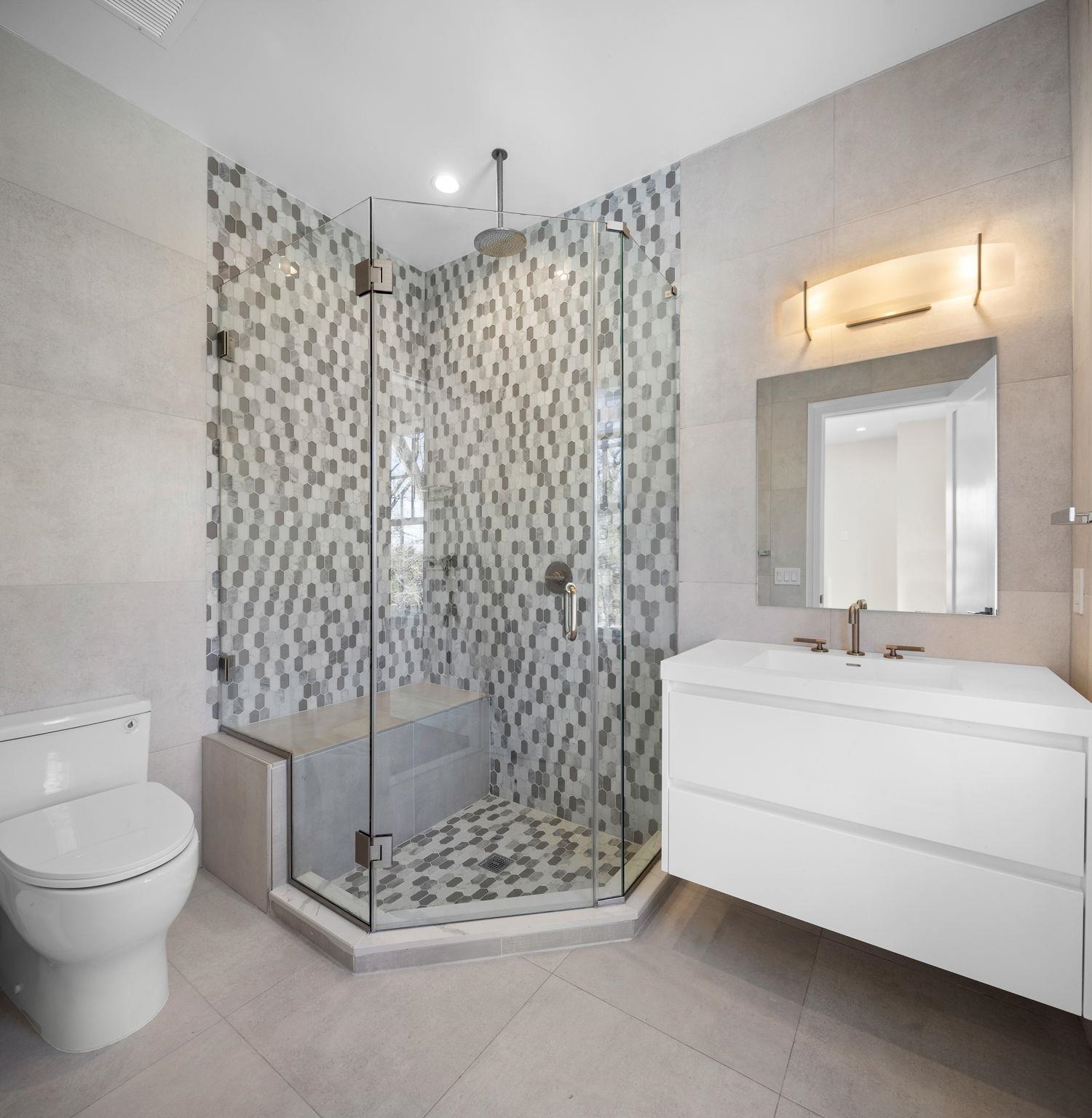 396 Knollwood Road Ridgewood, NJ 07450 - Photo 40 of 50 a bathroom with a sink toilet and shower