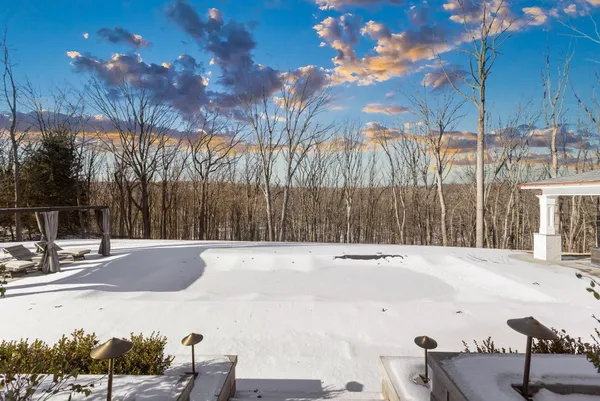 a view of outdoor space with swimming pool