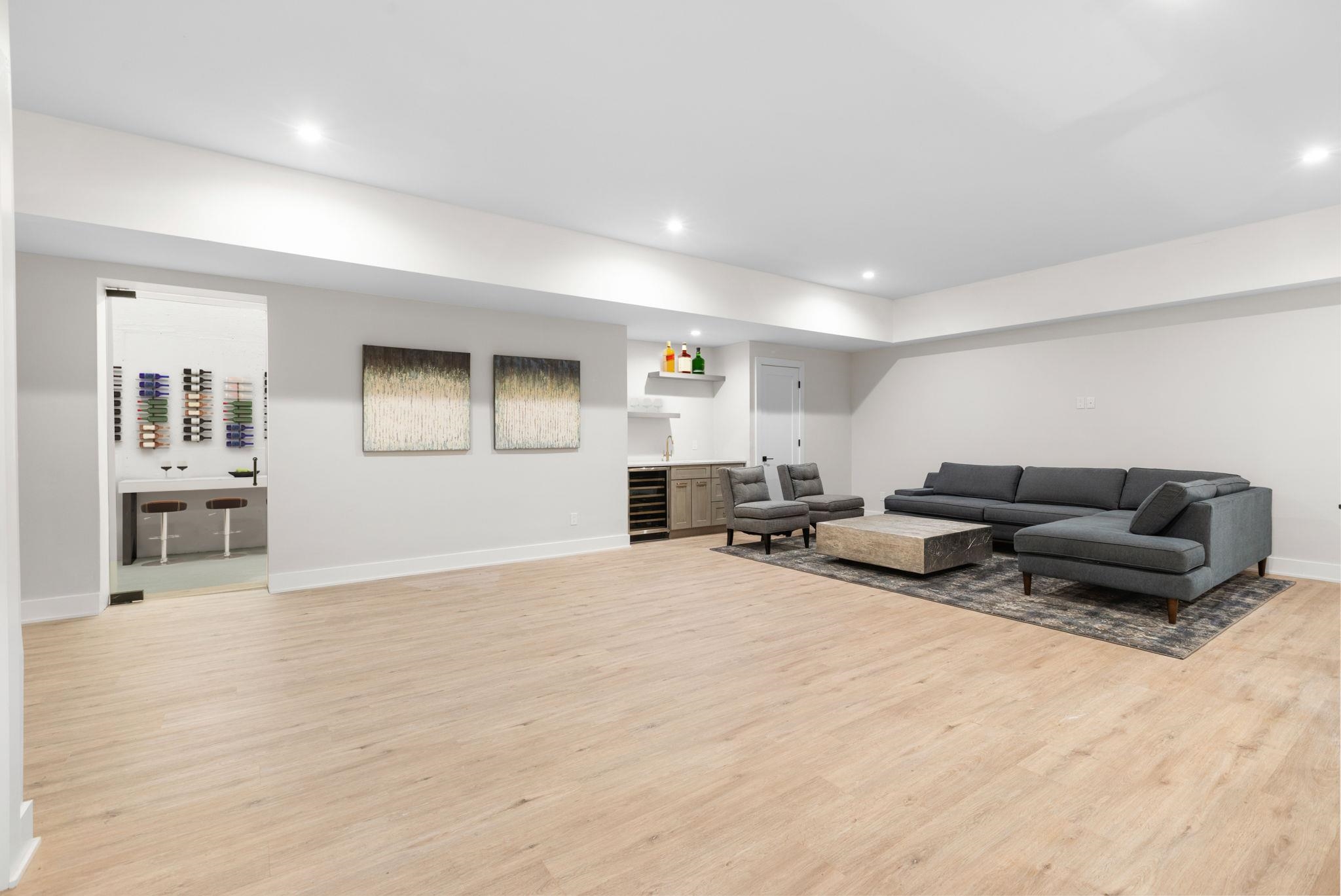 396 Knollwood Road Ridgewood, NJ 07450 - Photo 41 of 50 a living room with furniture and kitchen view