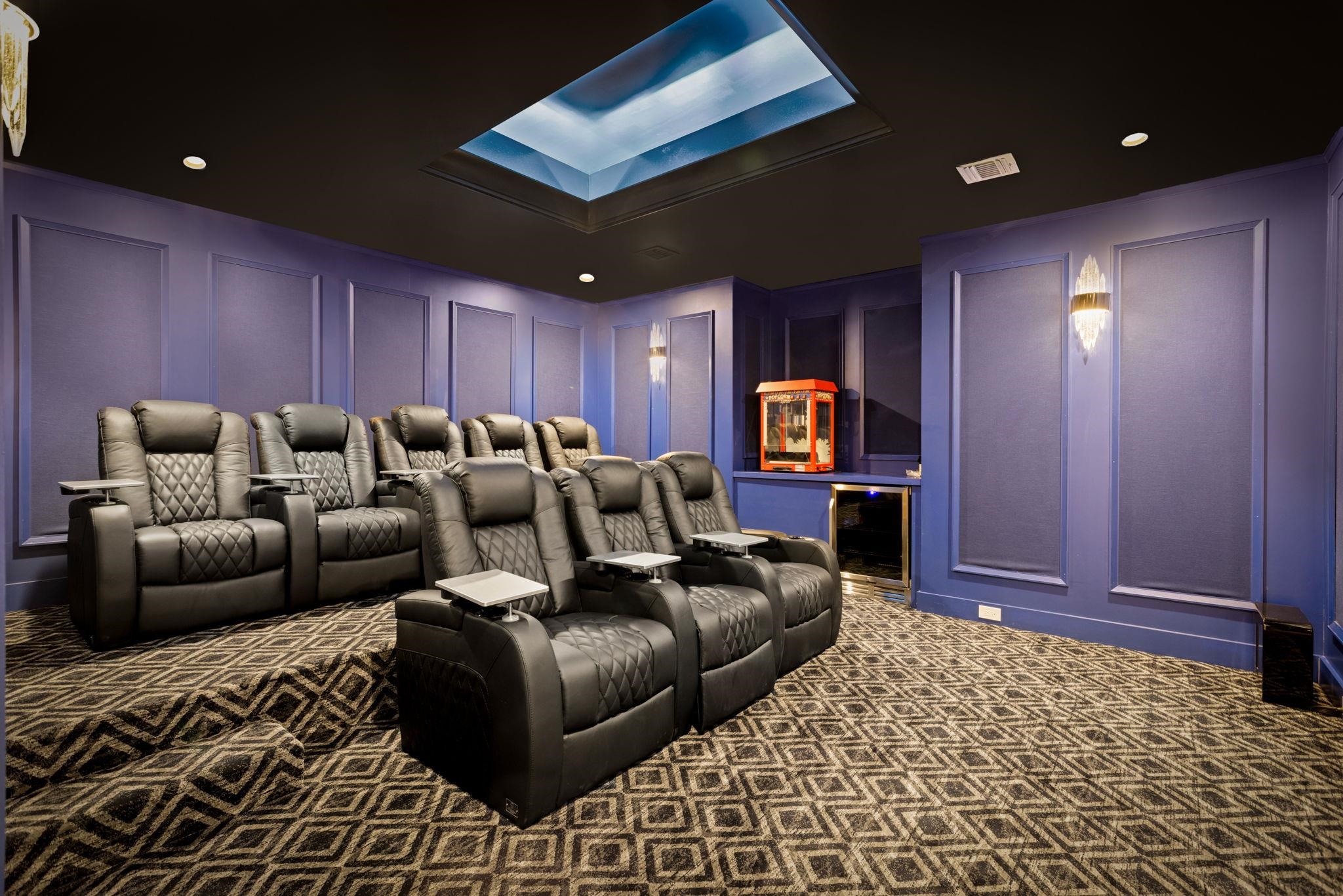 396 Knollwood Road Ridgewood, NJ 07450 - Photo 43 of 50 a projector room with furniture and a rug