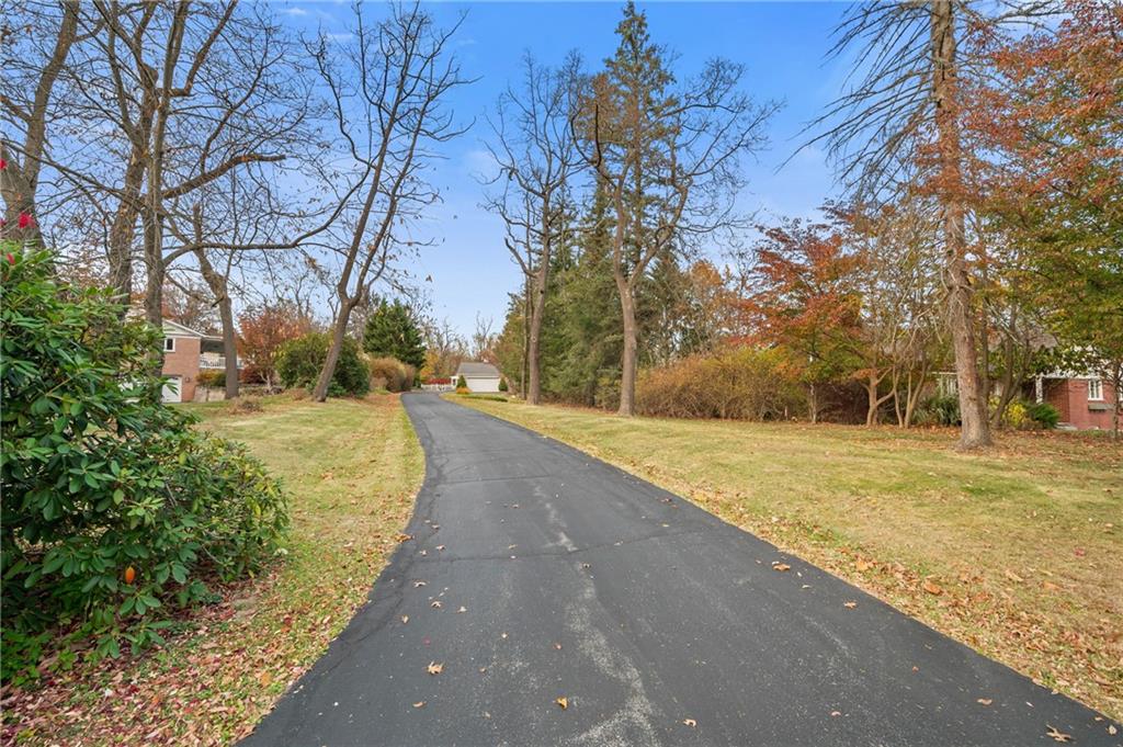 246 Sunset Road Pittsburgh, PA 15237 - Photo 34 of 38 a view of a yard with trees
