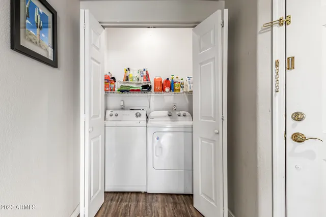 a utility room with dryer and washer