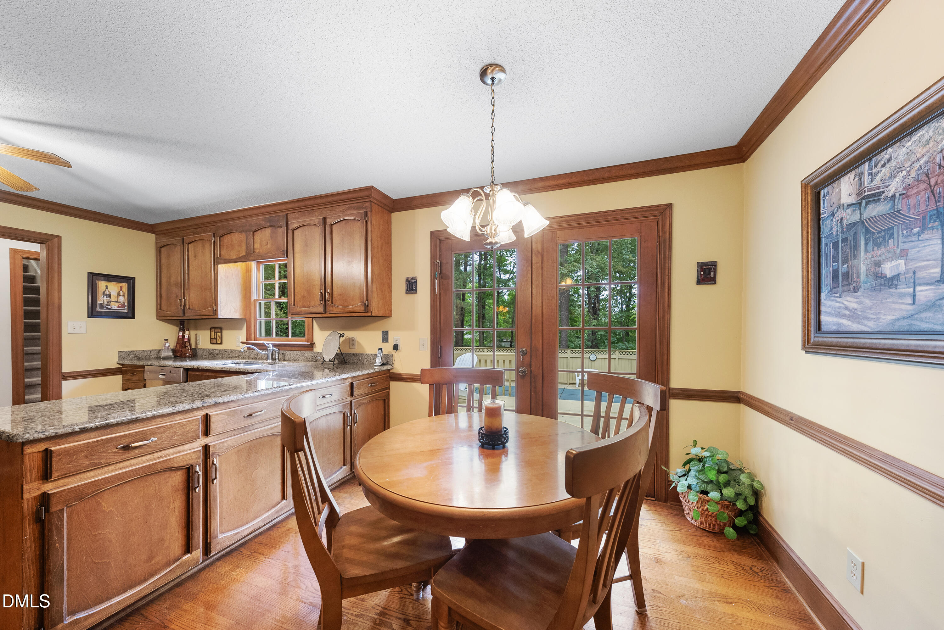 717 Misty Isle Place Raleigh, NC 27615 - Photo 15 of 59 Breakfast area with door to deck