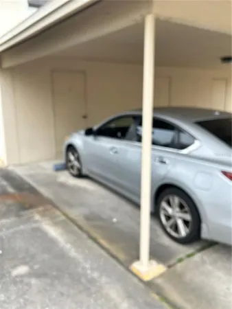 a view of empty room with windows