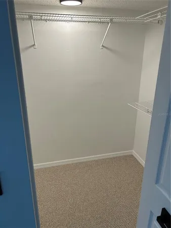 an empty room with a fireplace