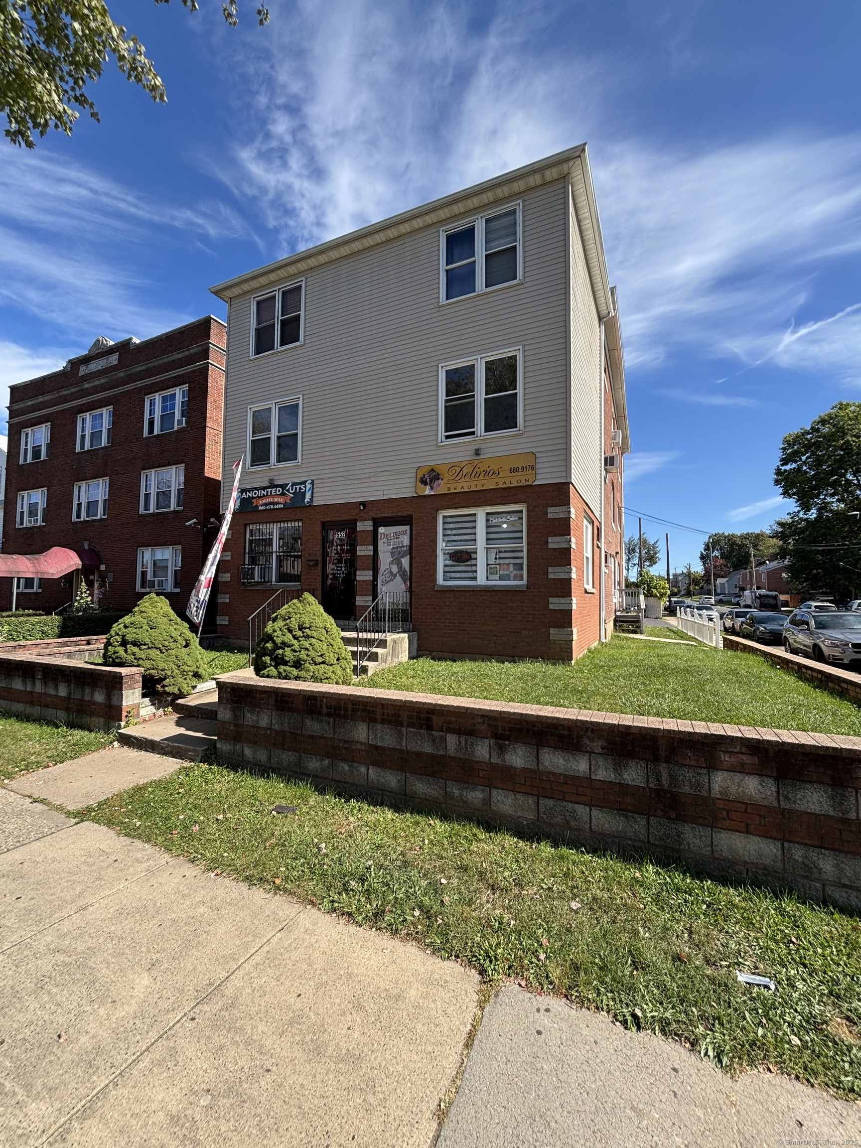 552 Franklin Avenue Hartford, CT 06114 - Photo 3 of 23 a front view of a house with a yard