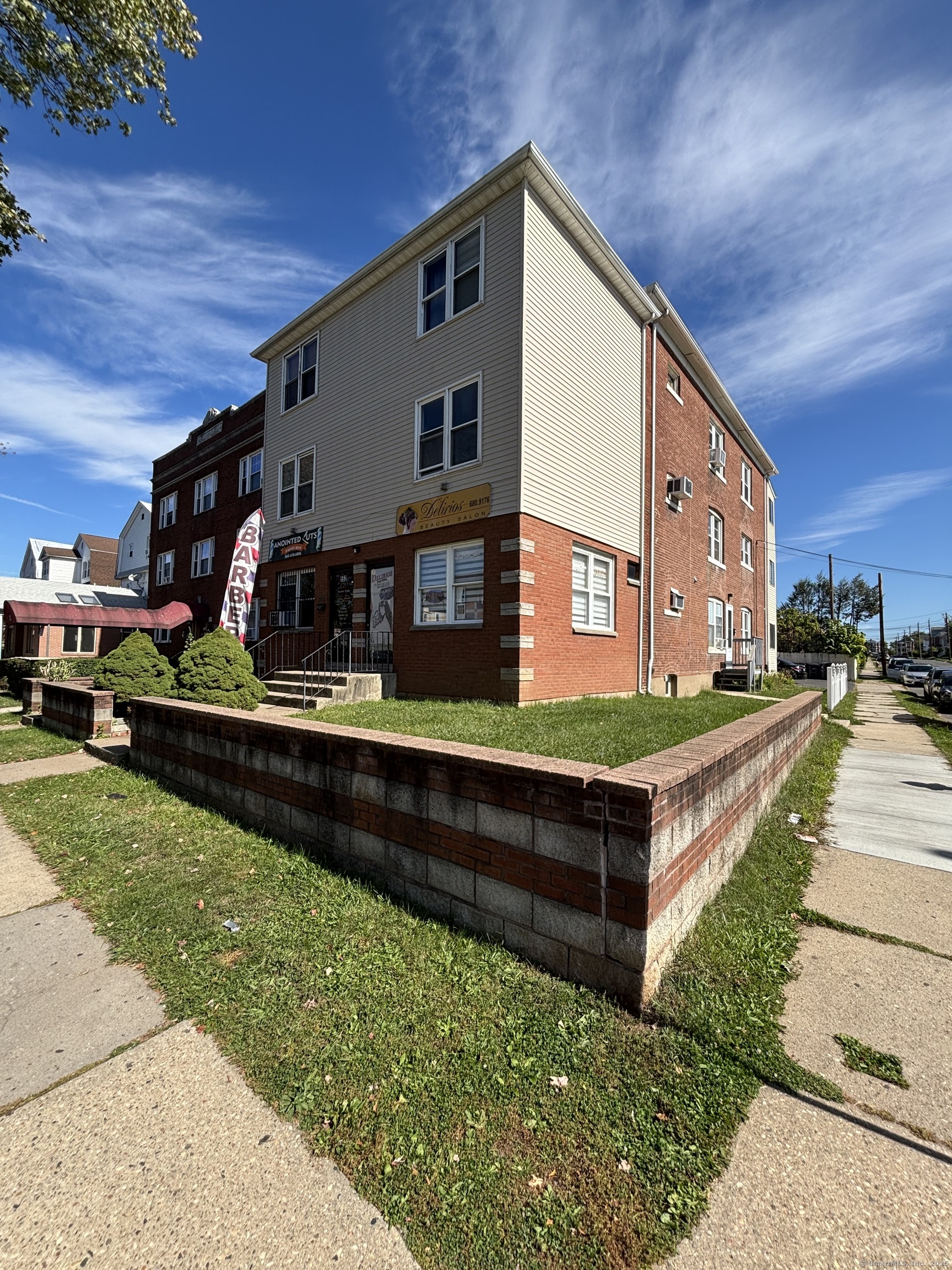 552 Franklin Avenue Hartford, CT 06114 - Photo 4 of 23 a front view of a house with a yard table and chairs