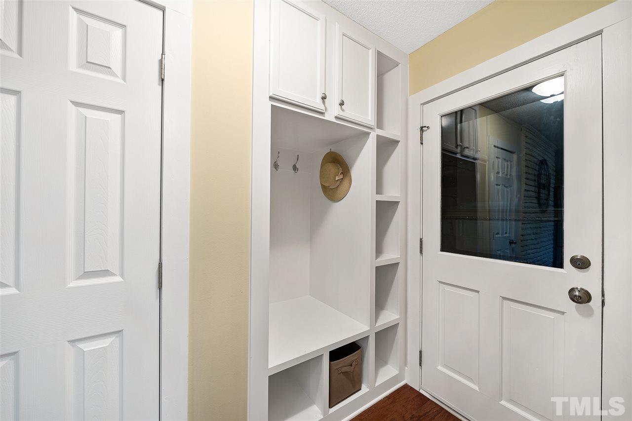 8609 Langtree Lane Raleigh, NC 27613 - Photo 22 of 30 a bathroom with a shower and mirror