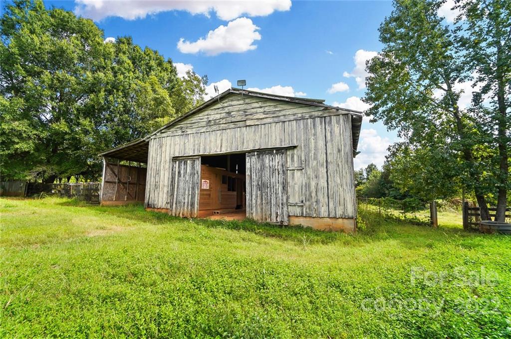 0 Unity Church Road Kannapolis, NC 28081 - Photo 2 of 16 a view of a house with a yard