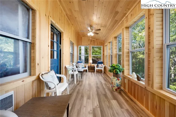 a view of a living room and dining room