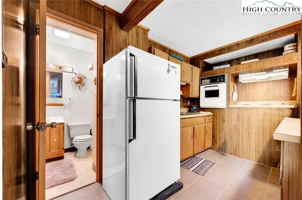 a bedroom with a bed and a closet