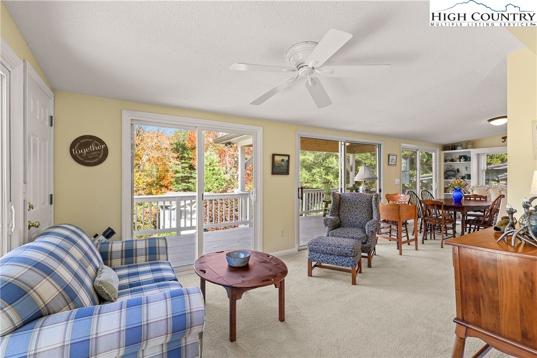 228 Snowshoe Loop Newland, NC 28657 - Photo 11 of 50 a living room with furniture and a large window