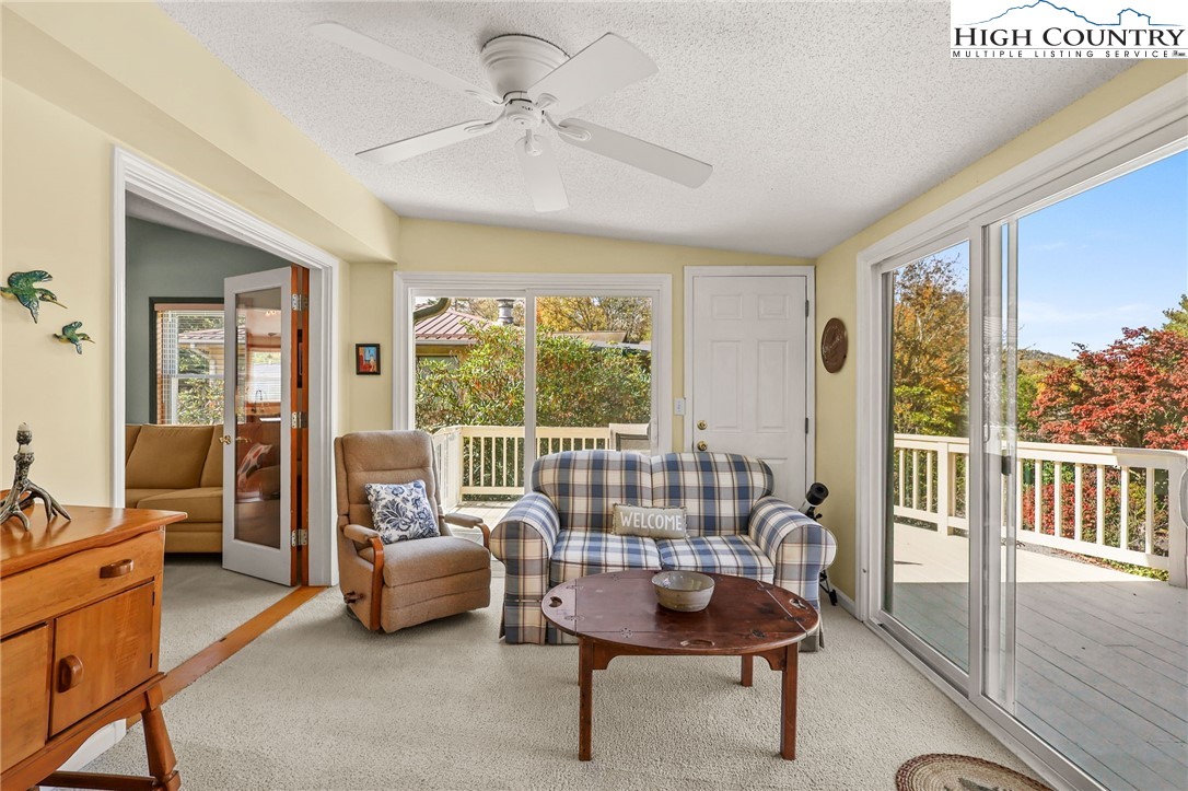 228 Snowshoe Loop Newland, NC 28657 - Photo 12 of 50 a living room with furniture and a large window