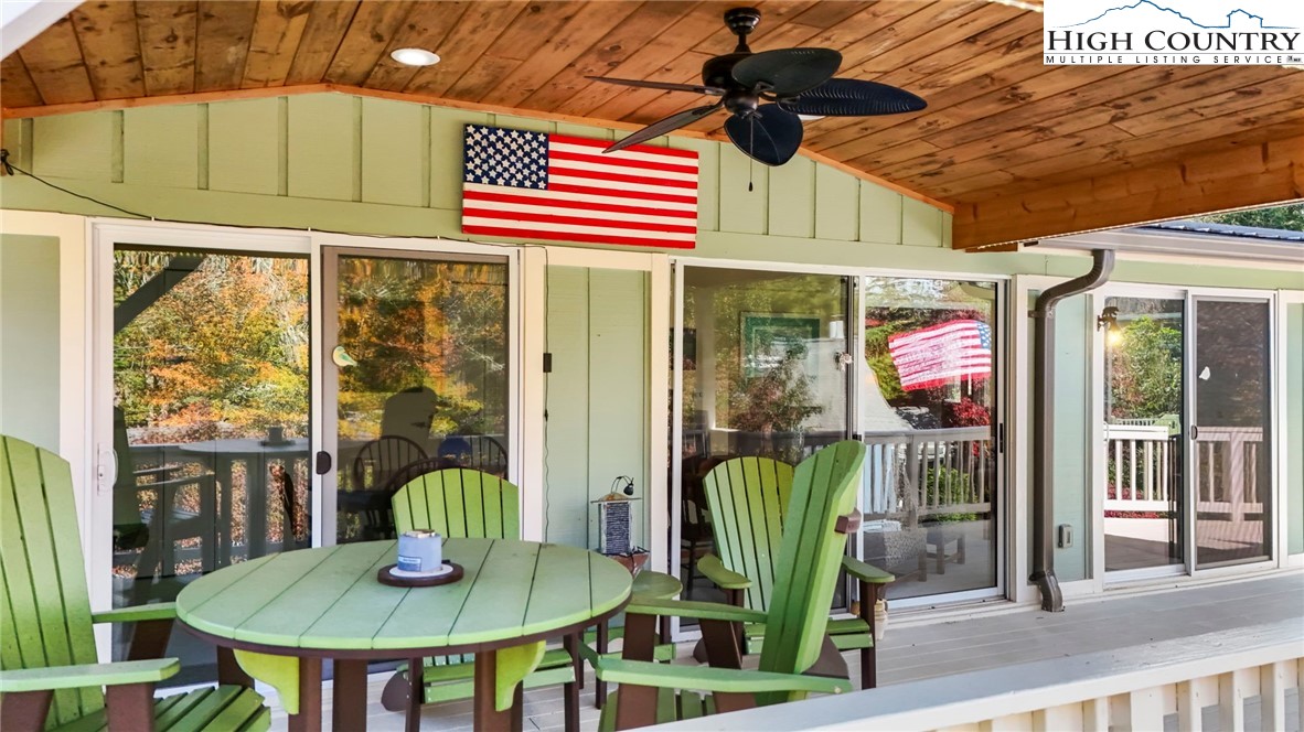 228 Snowshoe Loop Newland, NC 28657 - Photo 19 of 50 a view of a dining room with furniture window and outside view