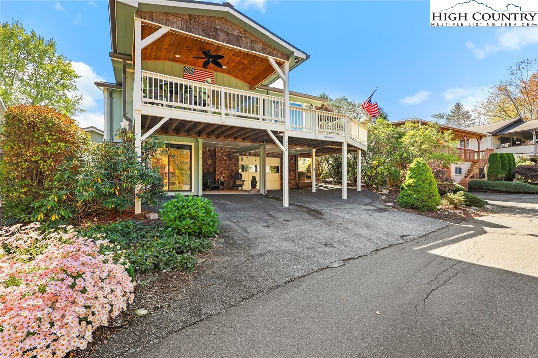 228 Snowshoe Loop Newland, NC 28657 - Photo 2 of 50 front view of a house with a street