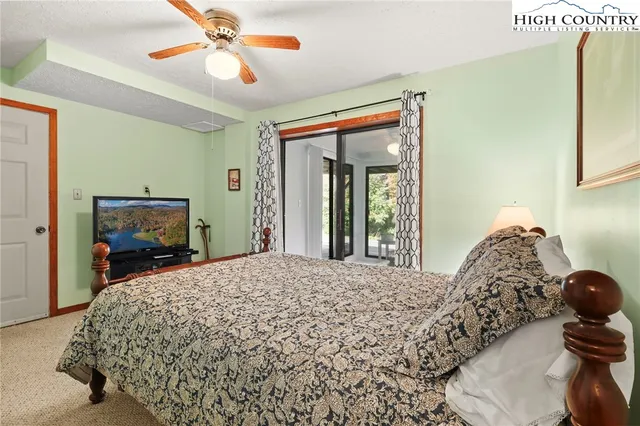 a bathroom with a sink toilet and mirror