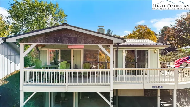 a view of a balcony with chairs