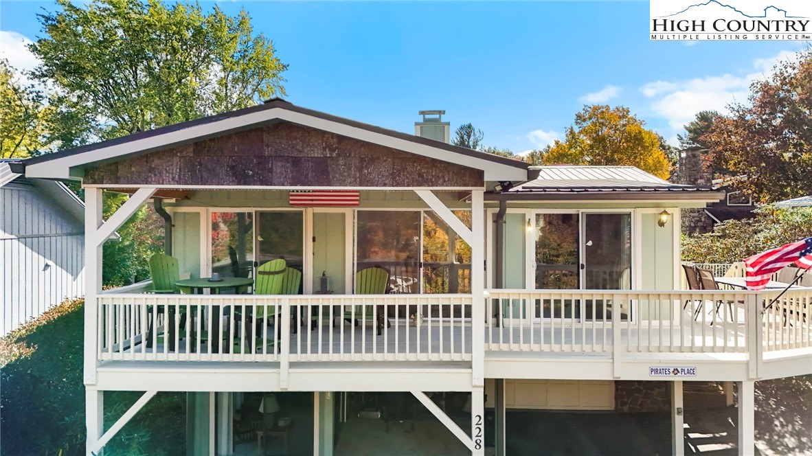 228 Snowshoe Loop Newland, NC 28657 - Photo 39 of 50 a view of a house with a deck