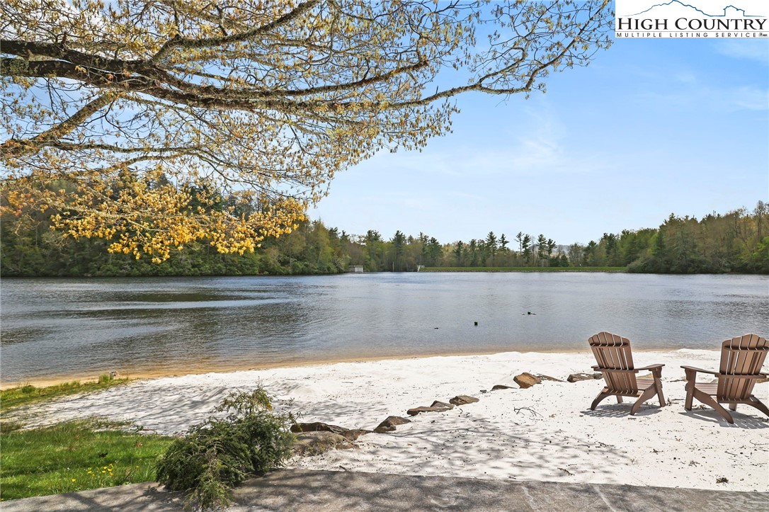 228 Snowshoe Loop Newland, NC 28657 - Photo 48 of 50 a view of a lake from a yard