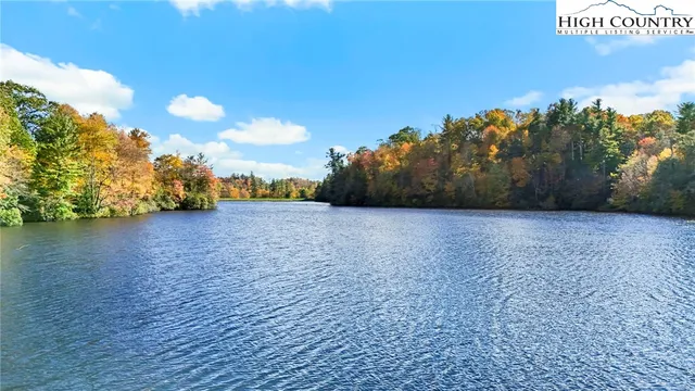 a view of a lake with a mountain