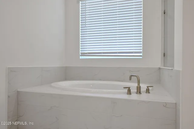 a bathroom with a bathtub