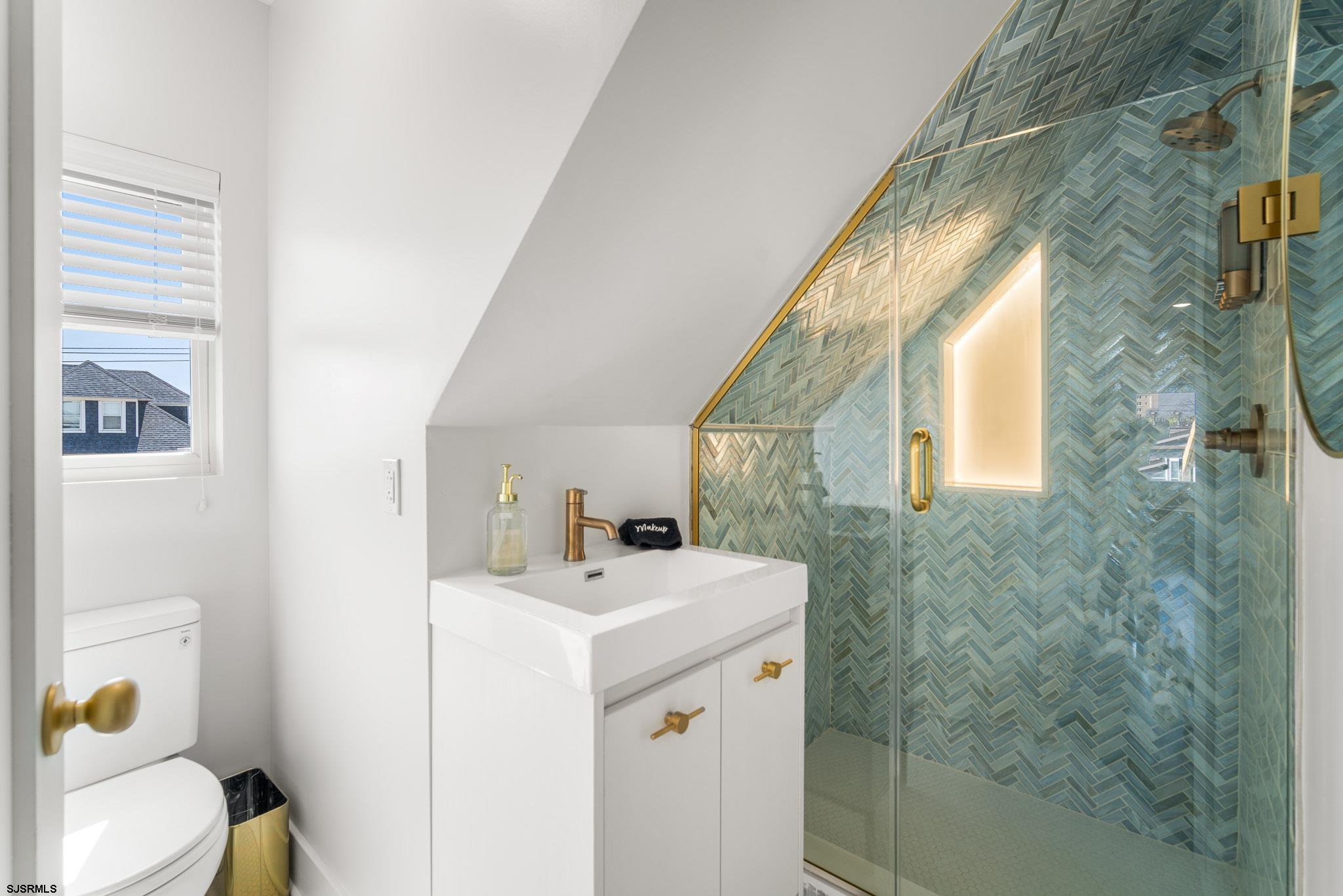 1059 Asbury Avenue, Unit 3 Ocean City, NJ 08226 - Photo 7 of 14 a utility room with dryer and washer